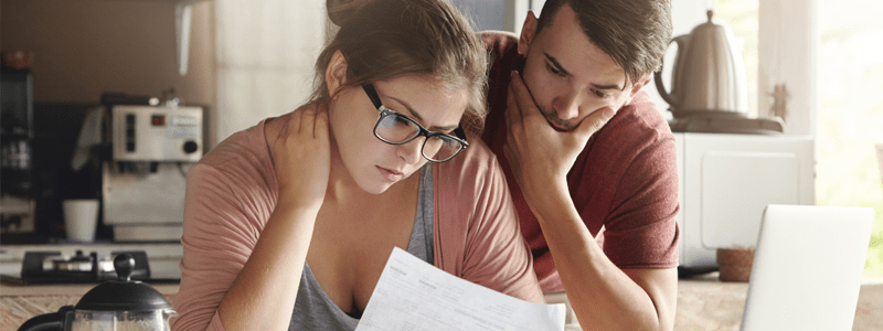 Couple looking at bills