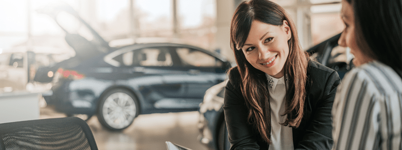 Lady at car showroom